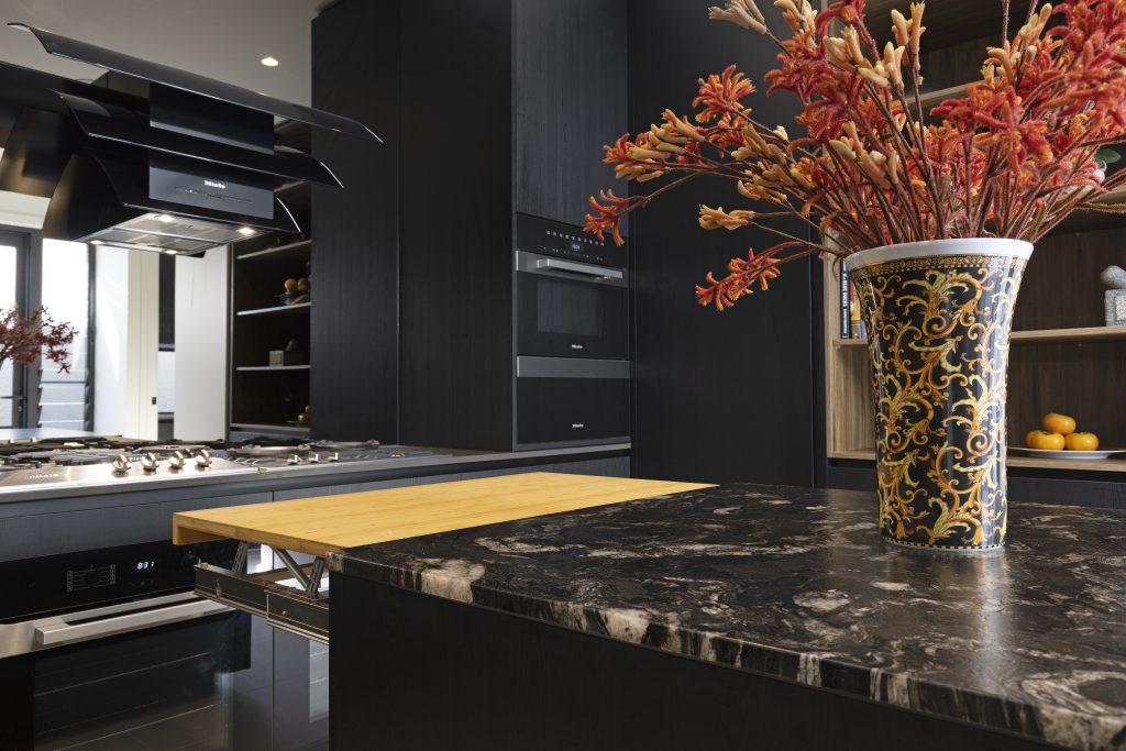 High-end Smart Kitchen design featuring stone benchtop and integrated appliances.