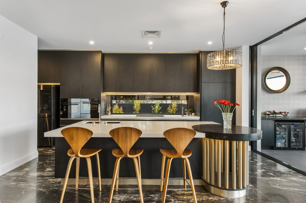 High-end Kitchen Design with integrated appliances, statement kitchen island, and marble flooring - Wood Marble & White Gold Coast Kitchen Design